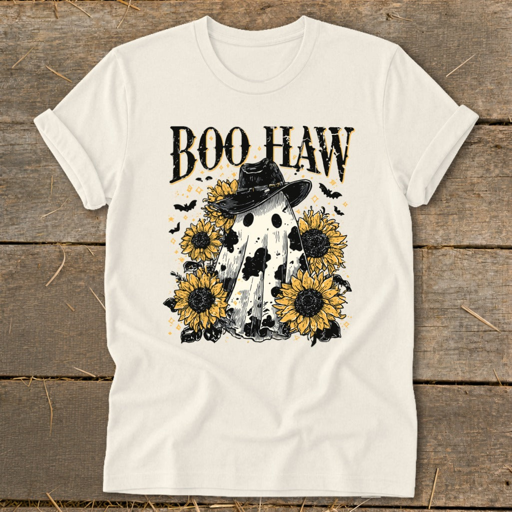Cream t-shirt with "Boo Haw" text, a cow-spotted ghost, sunflowers, and bats.