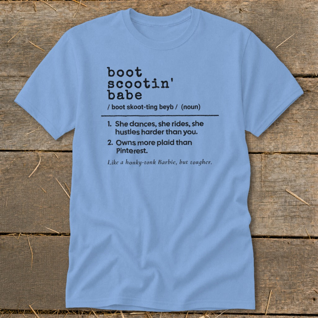 Light blue t-shirt with "boot scootin' babe" definition in black text.