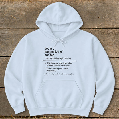 White hoodie with "boot scootin' babe" definition and humorous descriptions.