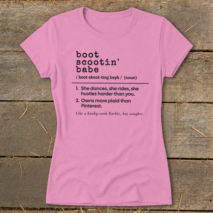 Pink t-shirt with black text defining "boot scootin' babe."
