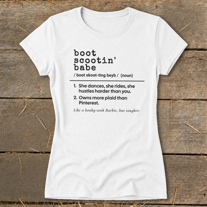 White t-shirt with "boot scootin' babe" definition and humorous descriptions.