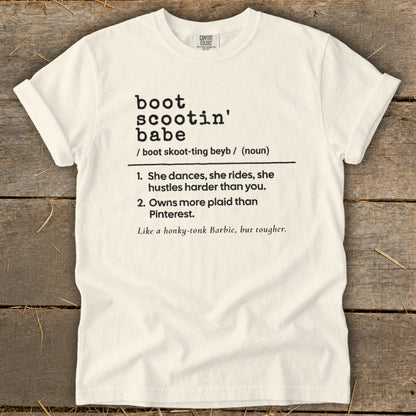 White t-shirt with "boot scootin' babe" definition and humorous description.