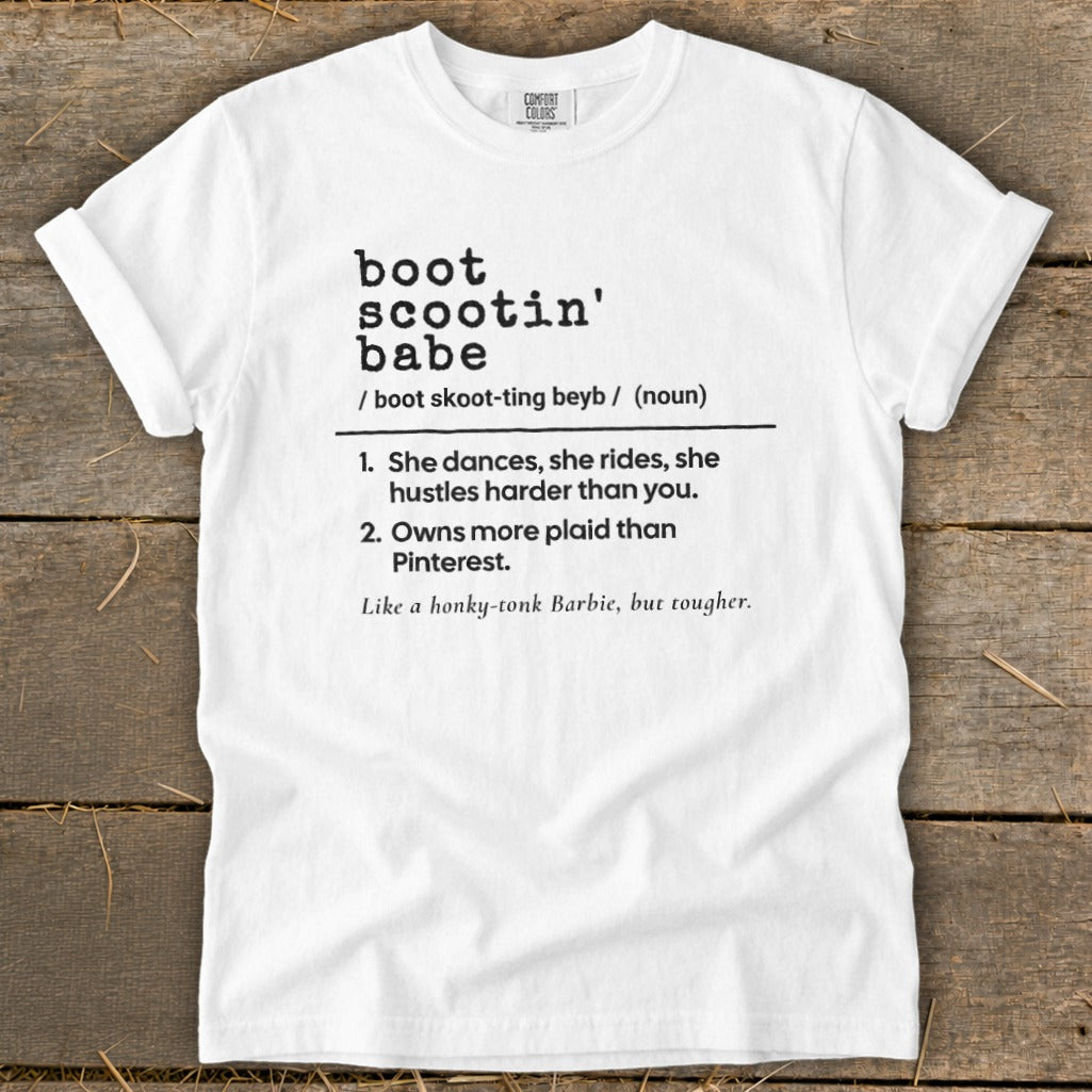 White t-shirt with "boot scootin' babe" definition printed on it.