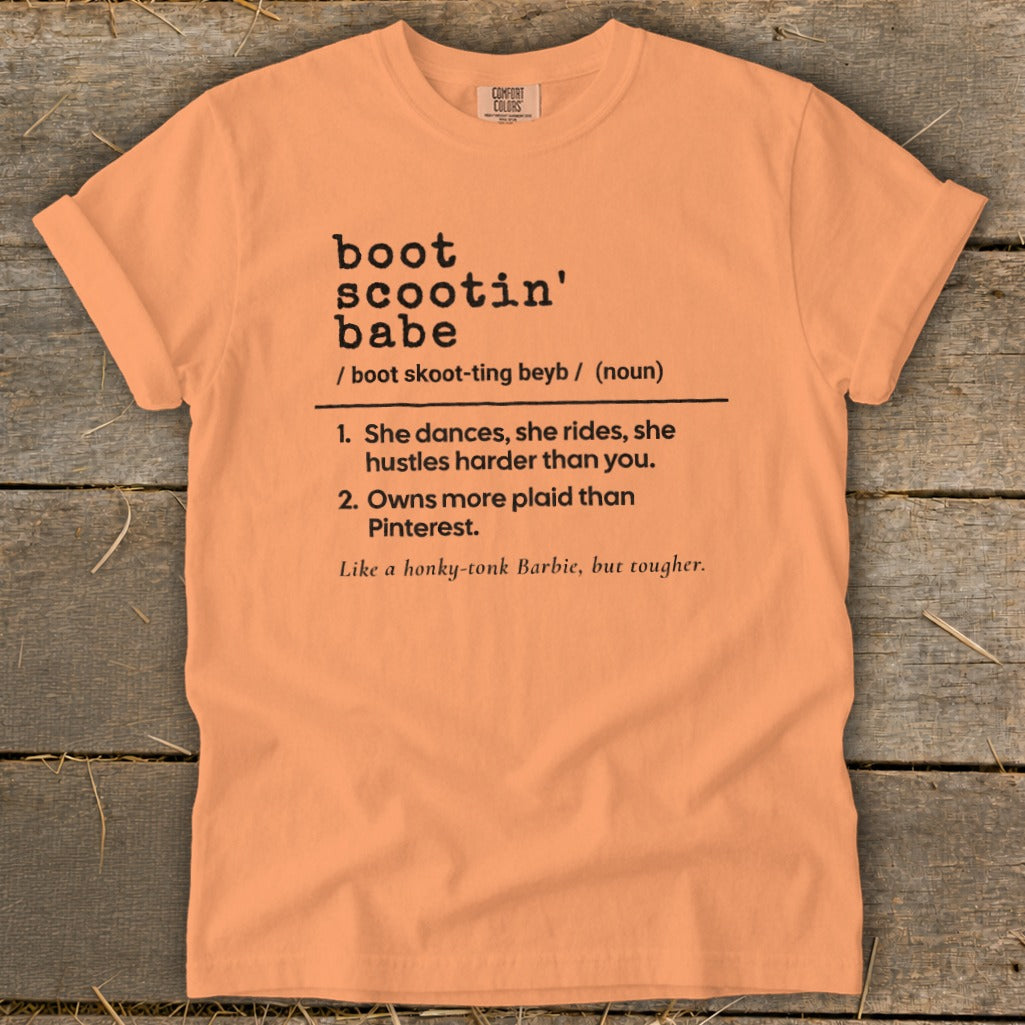 Peach t-shirt with "boot scootin' babe" definition and sassy descriptions.