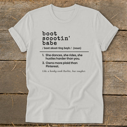 White t-shirt with "boot scootin' babe" definition and country-themed descriptions.