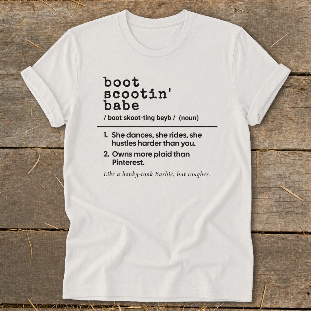 White t-shirt with "boot scootin' babe" definition and description.
