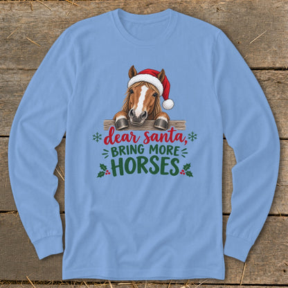 Light blue long-sleeve t-shirt with a graphic of a horse wearing a Santa hat and the text "dear santa, BRING MORE HORSES".