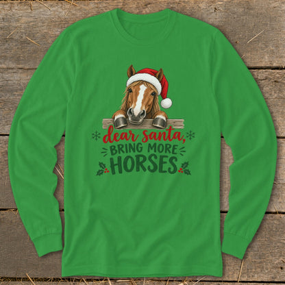 A green long-sleeve t-shirt with a graphic of a horse wearing a Santa hat and the text Dear Santa Bring More Horses.