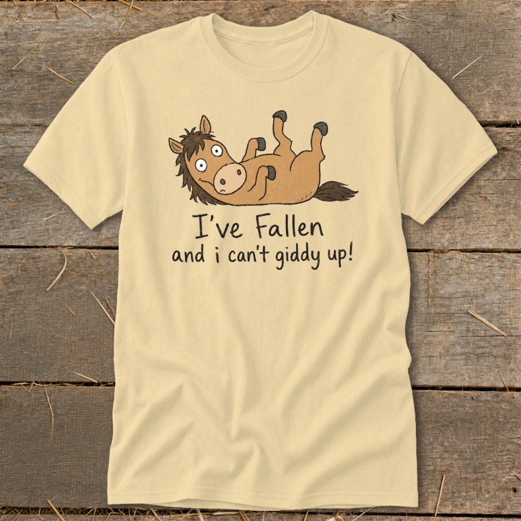 Light yellow t-shirt with cartoon horse and text "I've fallen and I can't giddy up!".