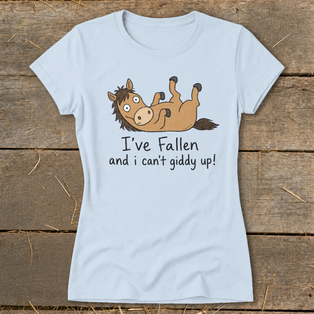 Light blue t-shirt with a cartoon horse lying on its back saying "I've fallen and I can't giddy up!".