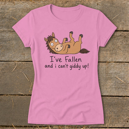 Pink t-shirt with cartoon horse and text "I've Fallen and I can't giddy up!".