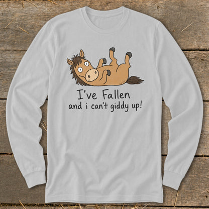 Long-sleeve shirt with cartoon horse lying on its back and text "I've Fallen and i can't giddy up!".