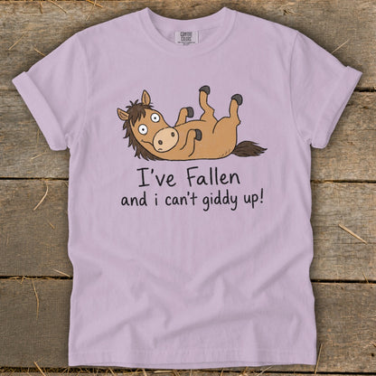 Lilac t-shirt with cartoon horse and text "I've Fallen and I can't giddy up!"