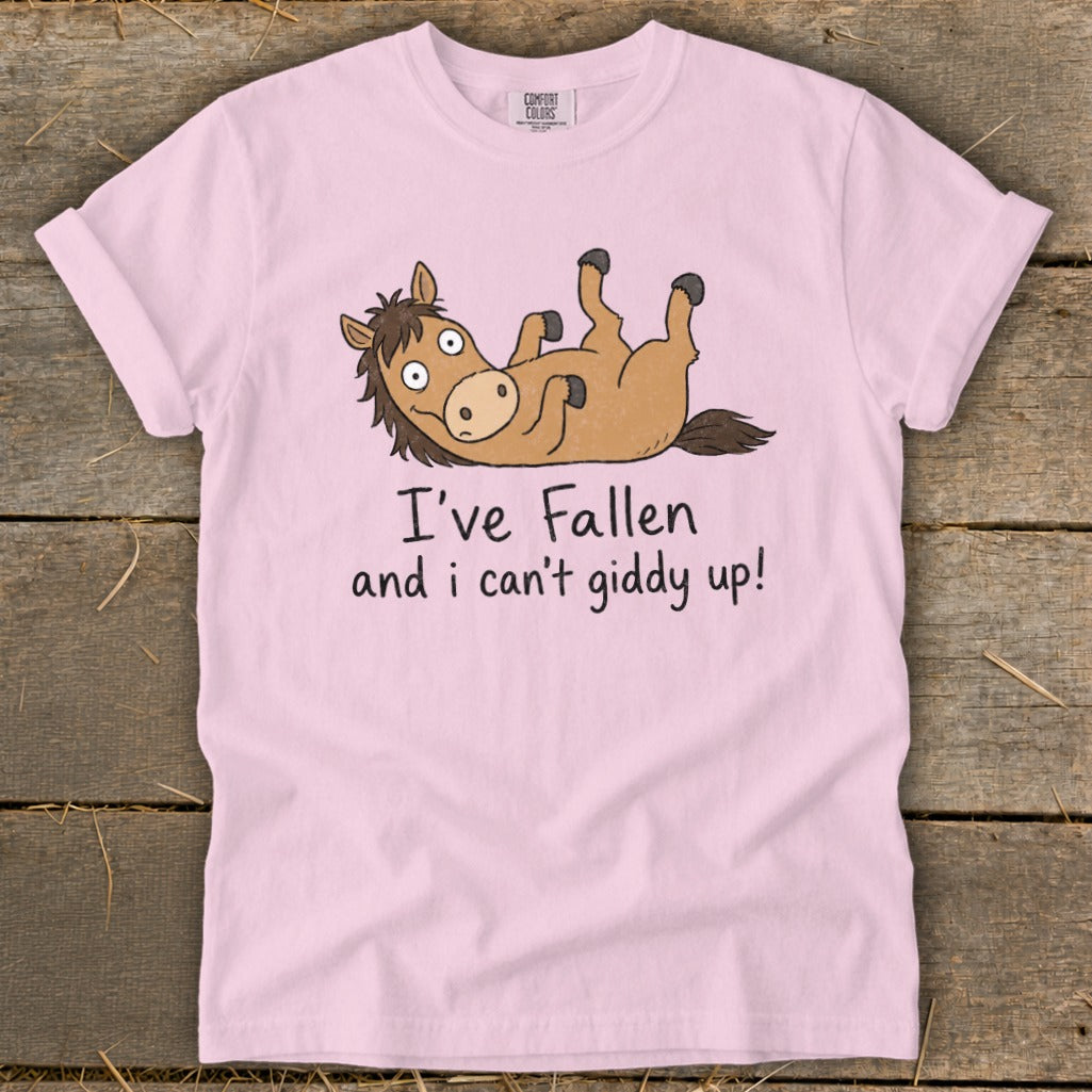 Pink t-shirt with cartoon horse and text "I've Fallen and i can't giddy up!".