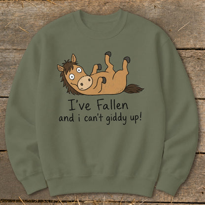 Olive green sweatshirt with a cartoon horse lying on its back, text reads "I've Fallen and I can't giddy up!"