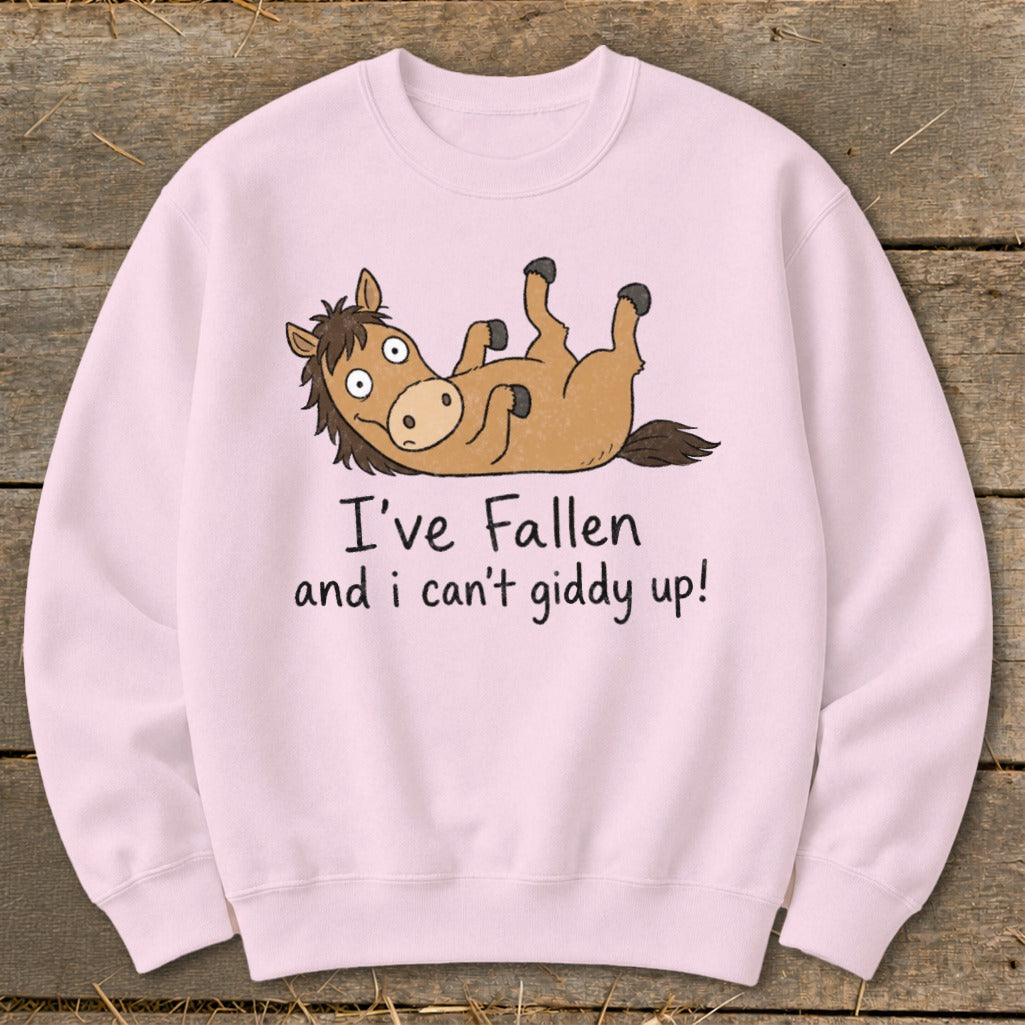 Pink sweatshirt with a cartoon horse lying on its back with text "I've Fallen and i can't giddy up!".