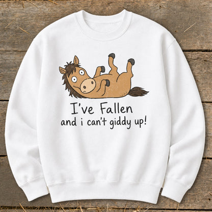 White sweatshirt with cartoon horse and text "I've Fallen and i can't giddy up!".
