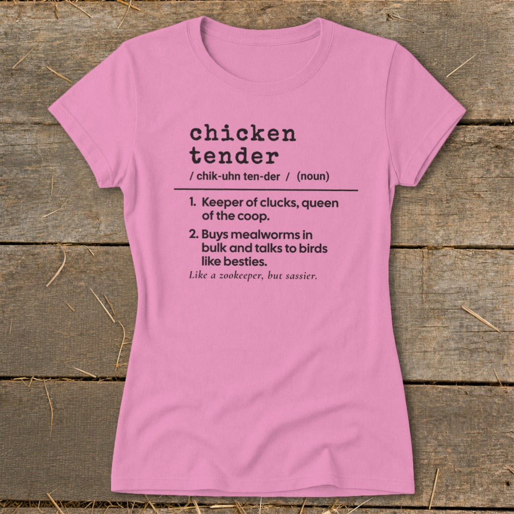 A pink short-sleeved t-shirt with a humorous definition of chicken tender printed in black.