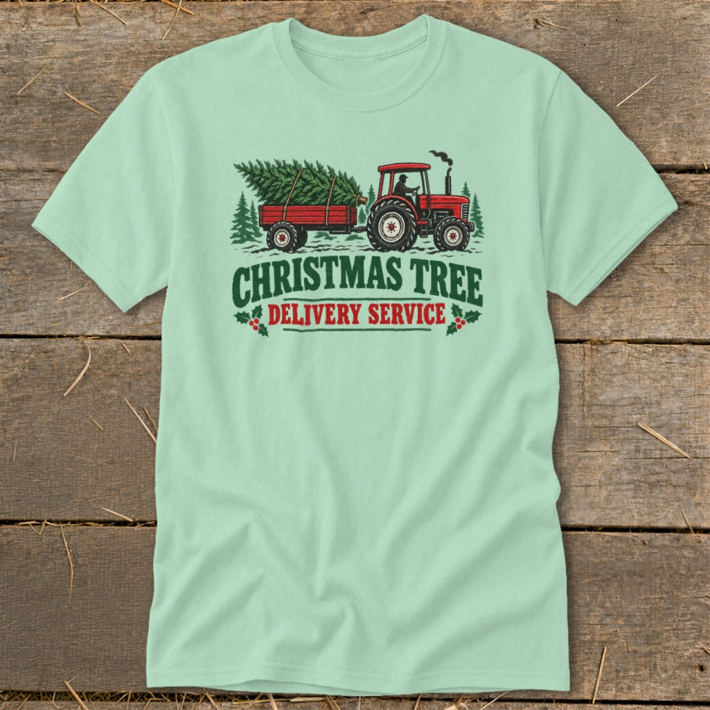 Tractor hauling Christmas tree in trailer, text "CHRISTMAS TREE DELIVERY SERVICE."