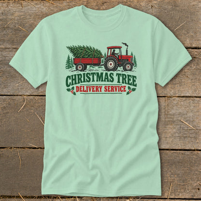 Tractor hauling Christmas tree in trailer, text "CHRISTMAS TREE DELIVERY SERVICE."