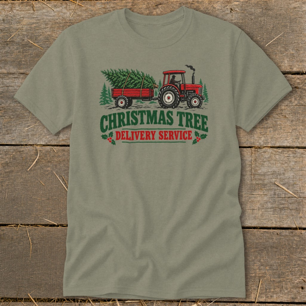 Tractor pulling trailer with Christmas tree, says "Christmas Tree Delivery Service".