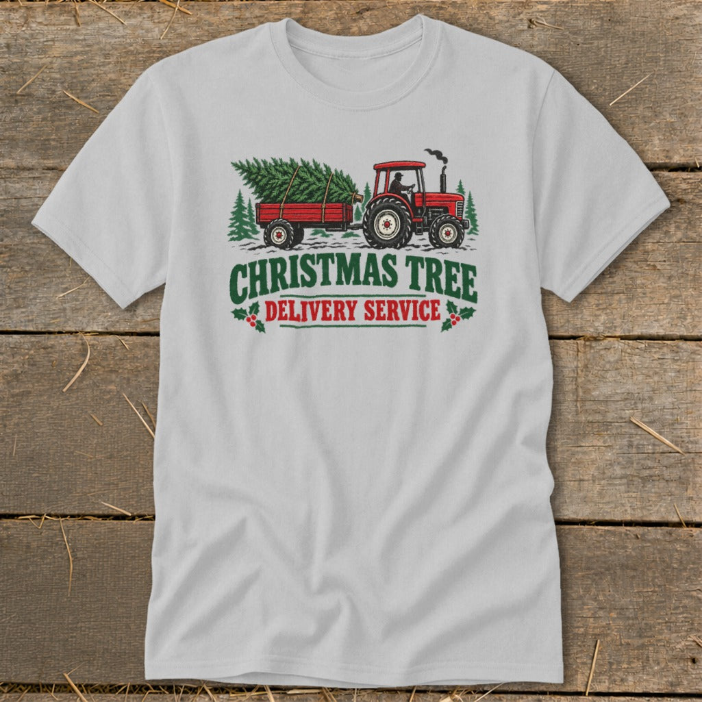 Red tractor pulling a trailer with a Christmas tree, text "Christmas Tree Delivery Service".