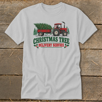Red tractor pulling a trailer with a Christmas tree, text "Christmas Tree Delivery Service".