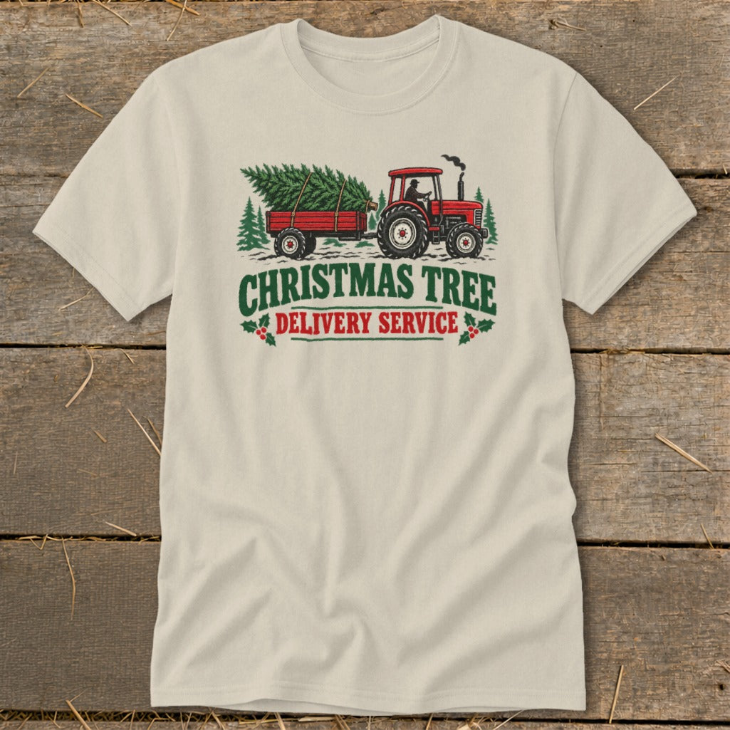 Christmas Tree Delivery Service graphic on a cream t-shirt with tractor and trailer.