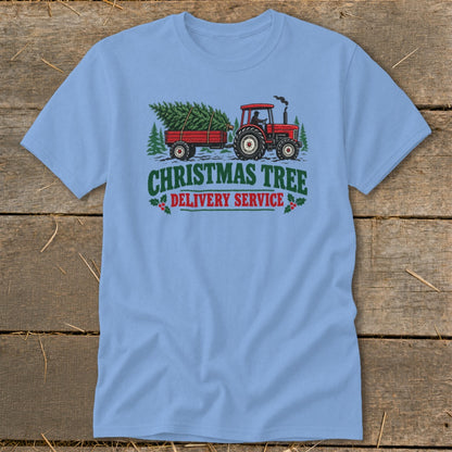 Red tractor pulling trailer with Christmas tree, text reads "Christmas Tree Delivery Service".