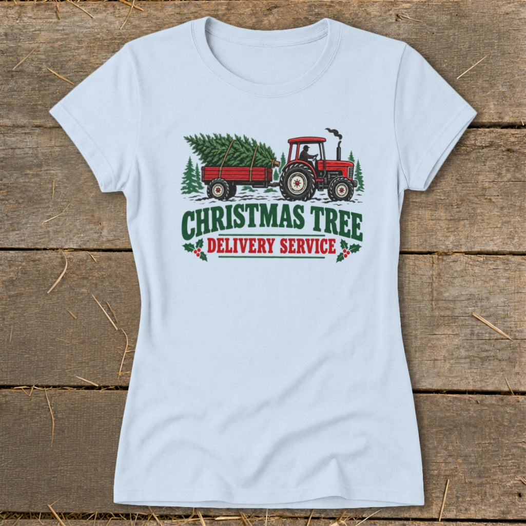 Red tractor pulling a trailer with Christmas trees, text reads "Christmas Tree Delivery Service."