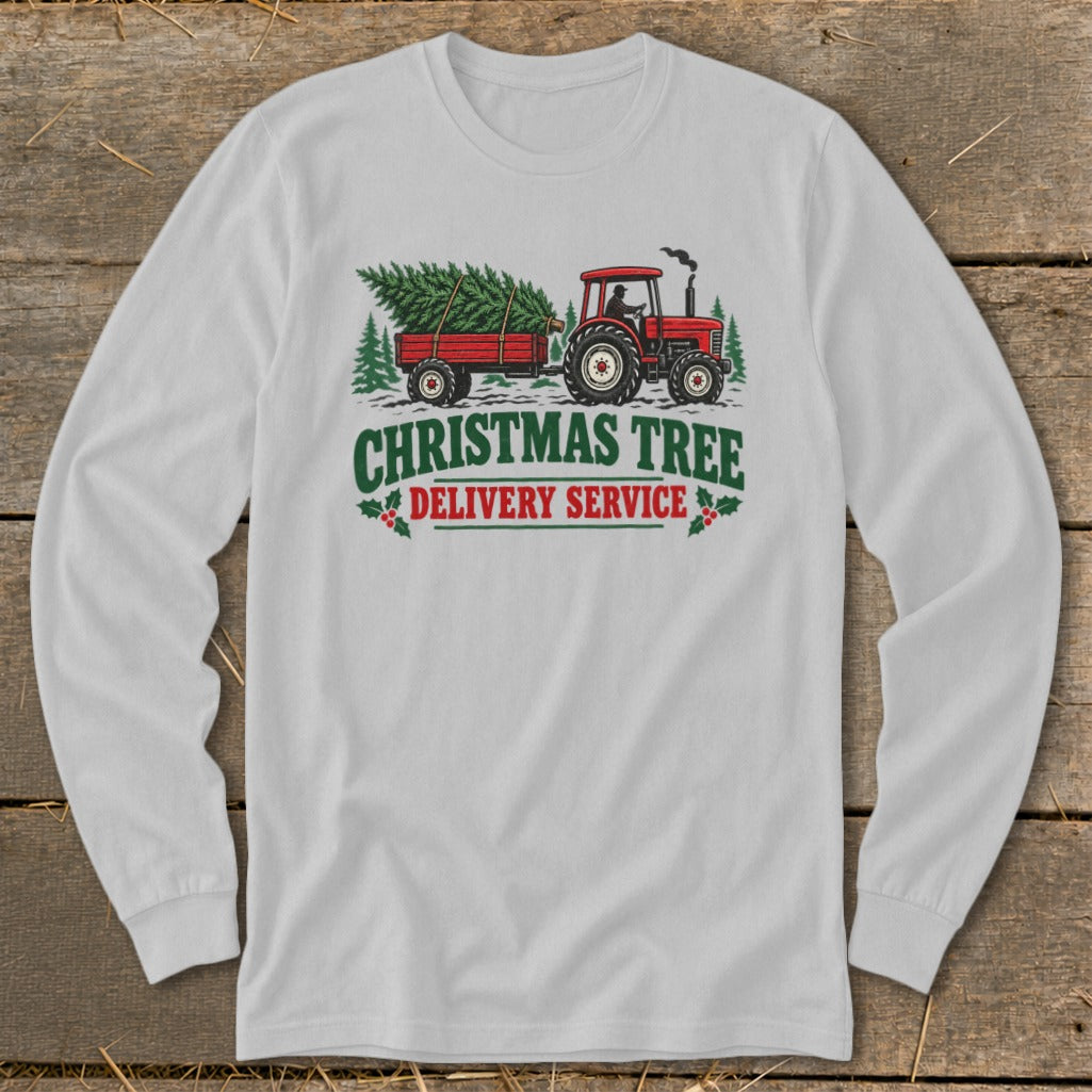 Red tractor pulling a trailer with Christmas trees. "Christmas Tree Delivery Service" text.