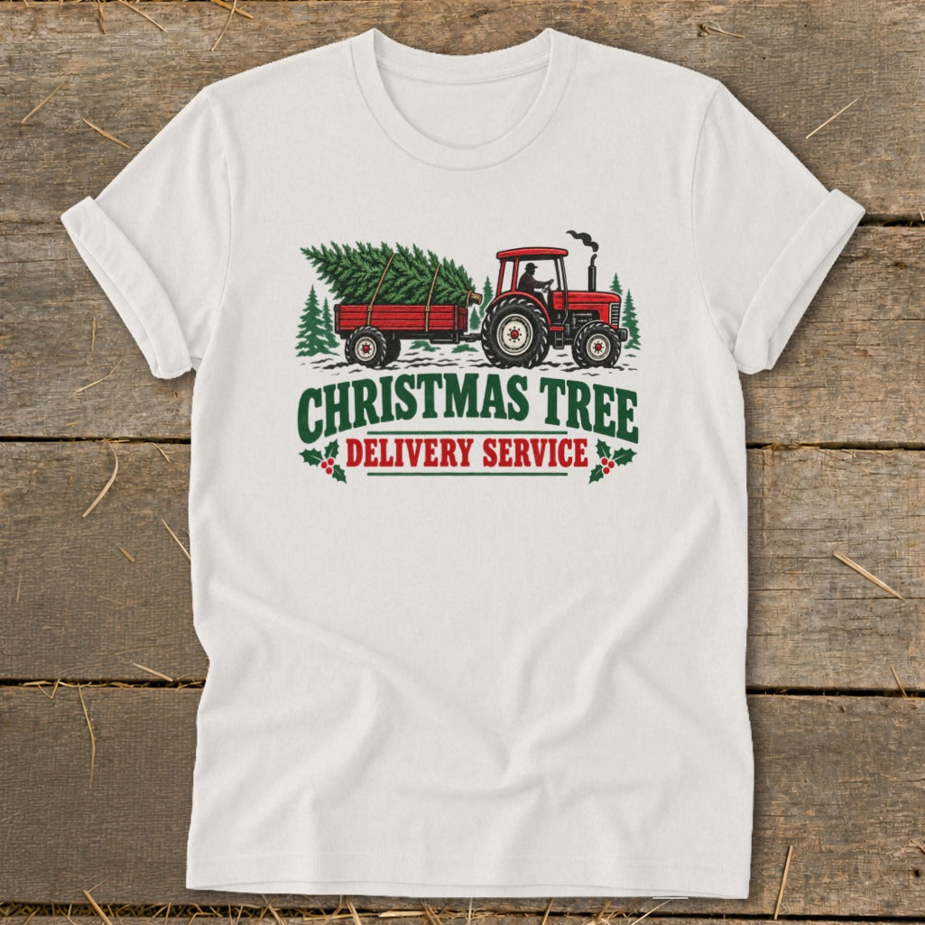 Red tractor hauling a Christmas tree with "Christmas Tree Delivery Service" text.