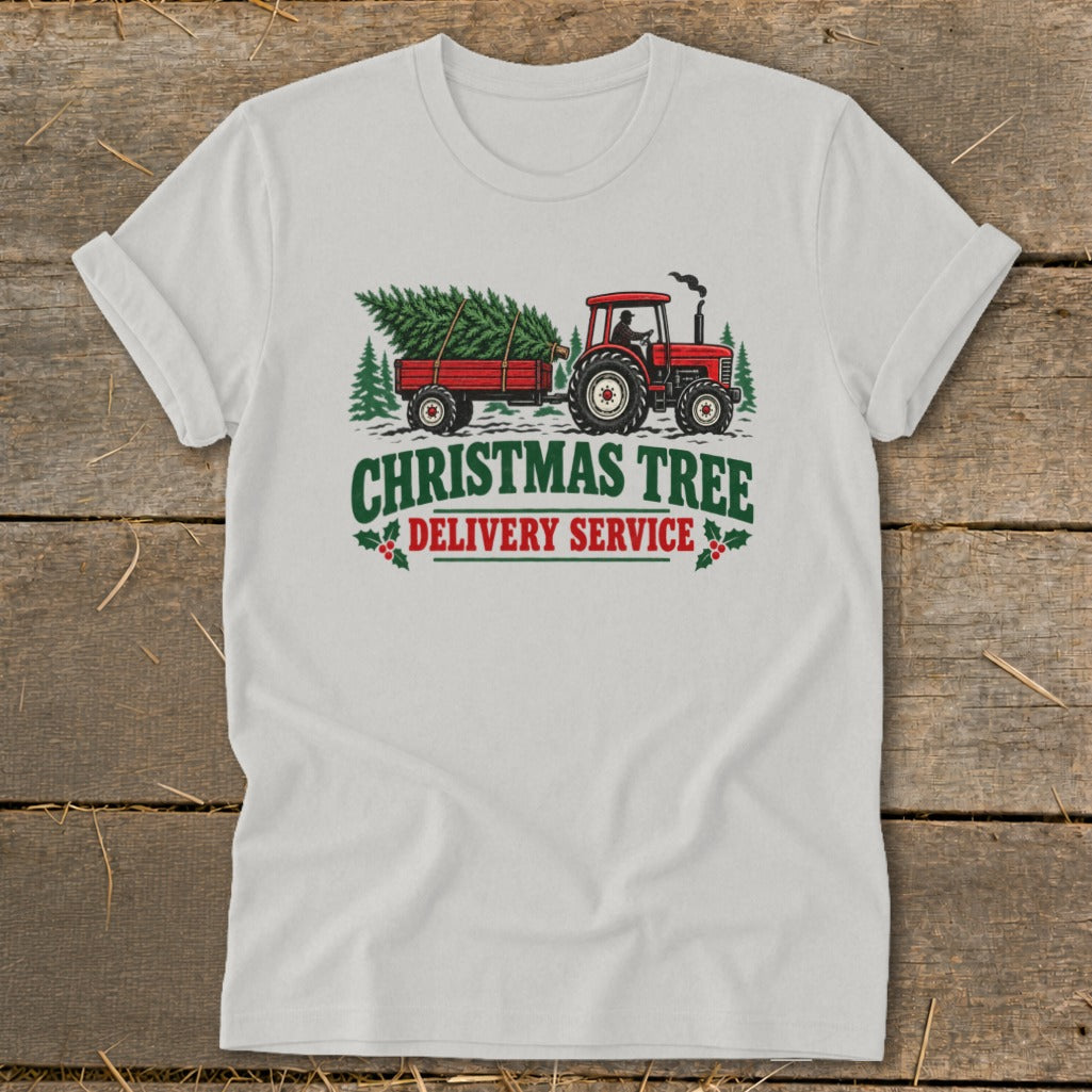 Red tractor pulling a Christmas tree on a trailer, "Christmas Tree Delivery Service" text.