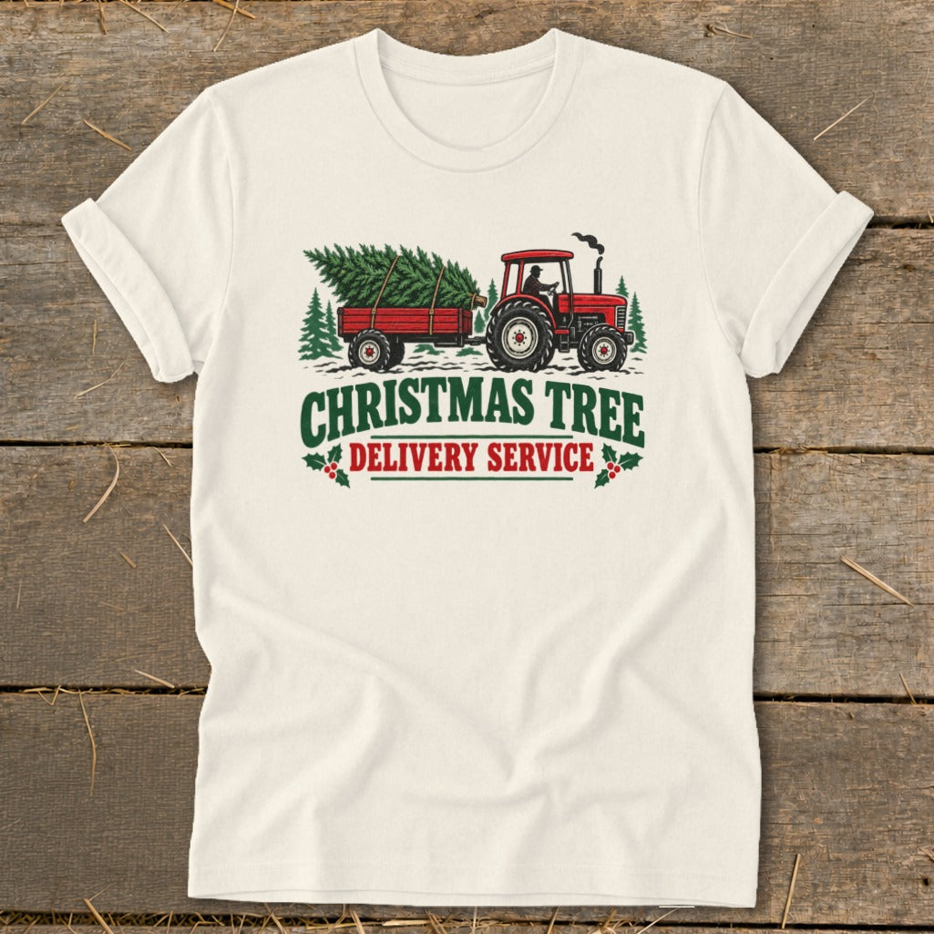 Tractor towing a Christmas tree with text "Christmas Tree Delivery Service".