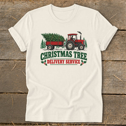 Tractor towing a Christmas tree with text "Christmas Tree Delivery Service".