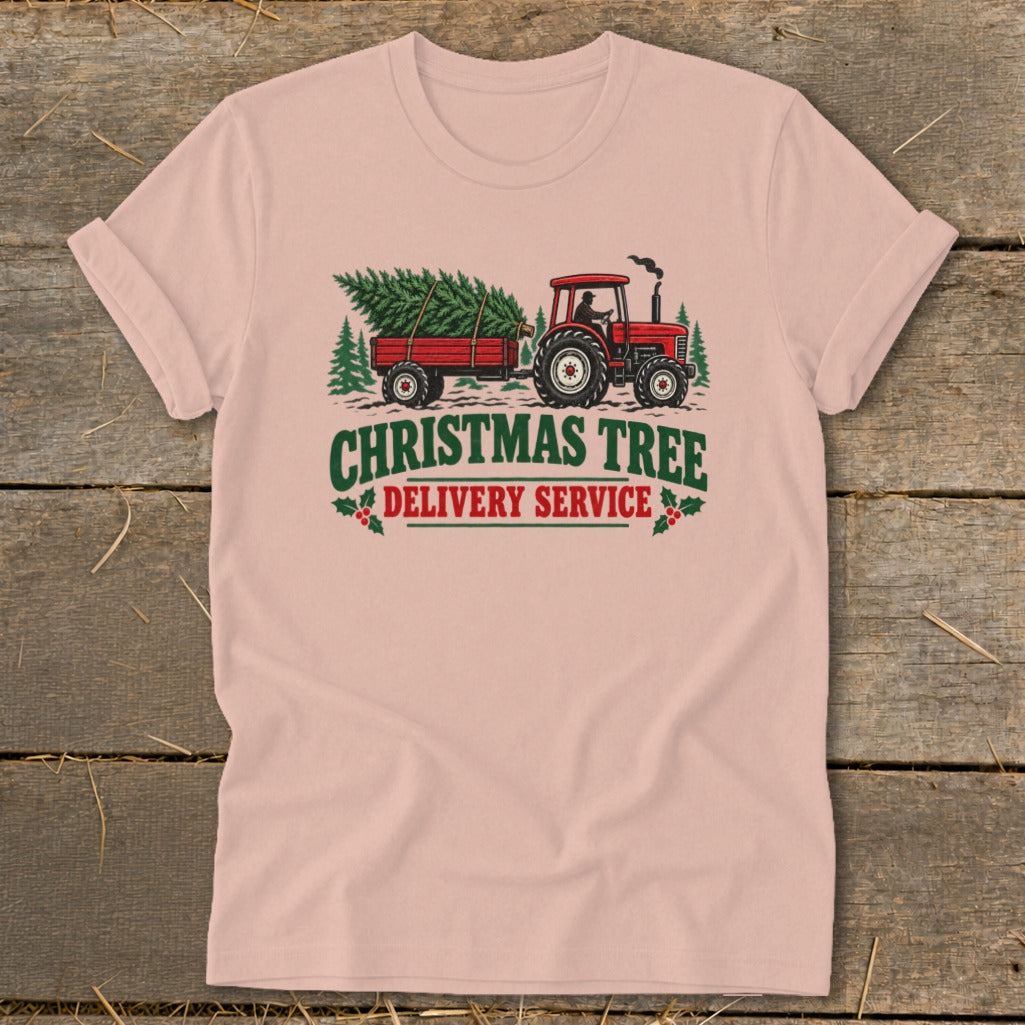Red tractor pulling a trailer with a Christmas tree, text reads "Christmas Tree Delivery Service".