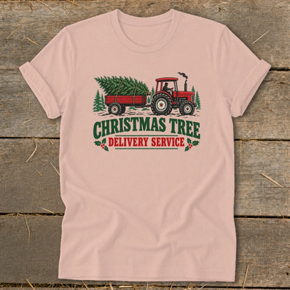 Red tractor pulling a trailer with a Christmas tree, text reads "Christmas Tree Delivery Service".