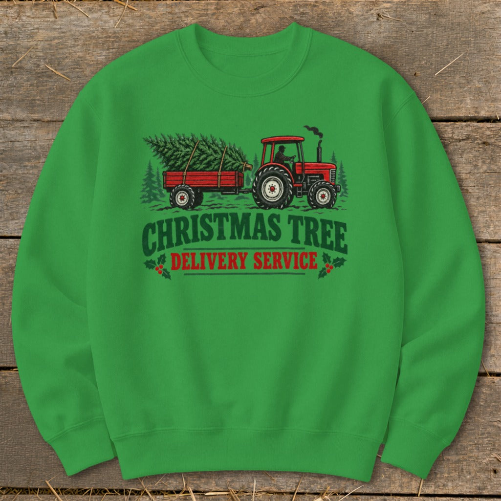 Red tractor pulling a trailer with a Christmas tree, text "Christmas Tree Delivery Service".