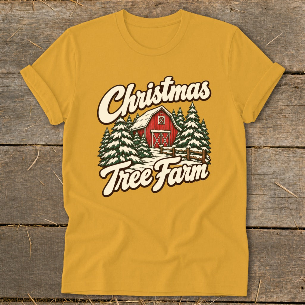 Yellow t-shirt with "Christmas Tree Farm" text and snowy barn scene graphic.