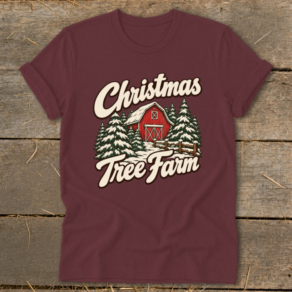 Maroon t-shirt with "Christmas Tree Farm" text and a red barn with pine trees.