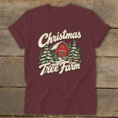 Maroon t-shirt with "Christmas Tree Farm" text and a red barn with pine trees.