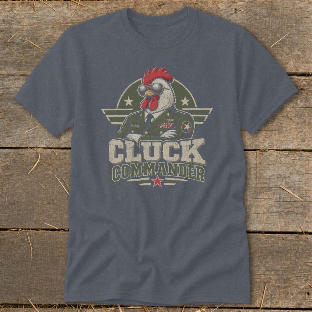 Dark gray t-shirt featuring a graphic of a chicken in a military uniform wearing sunglasses, with the text "CLUCK COMMANDER".