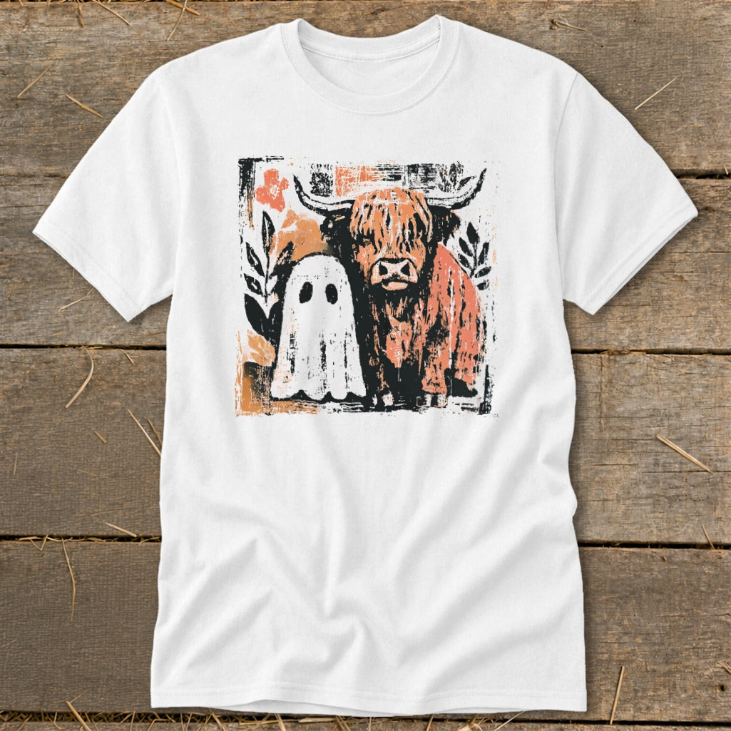 White t-shirt with a distressed print of a Highland cow and a ghost.