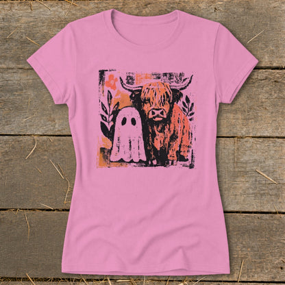 Pink t-shirt with graphic of a highland cow and a ghost.