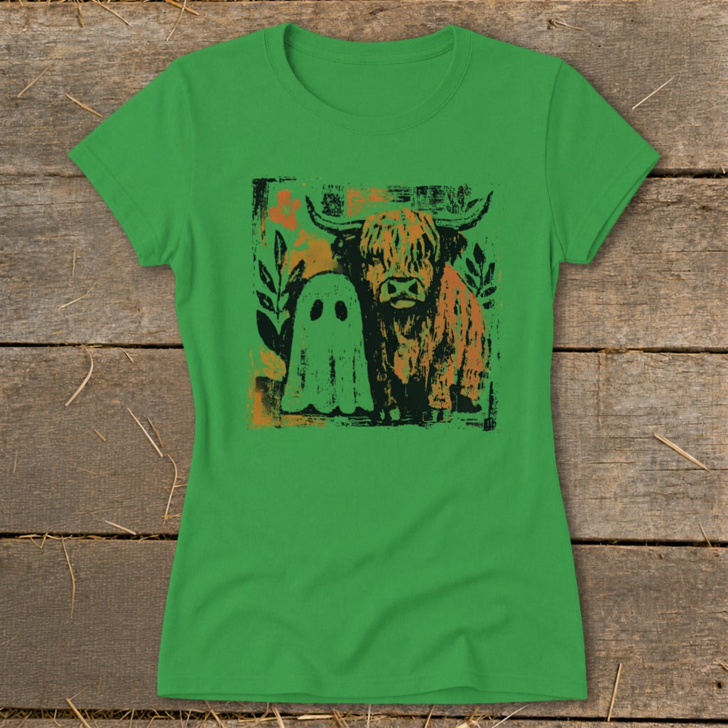 Green t-shirt with a graphic of a Highland cow and a ghost.