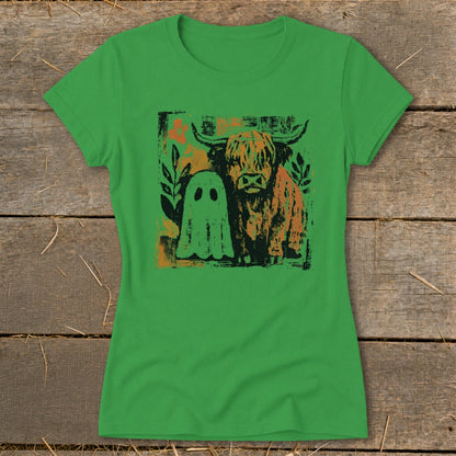Green t-shirt with a graphic of a Highland cow and a ghost.