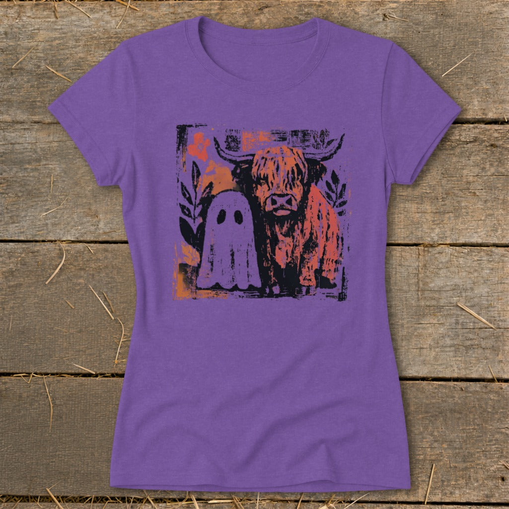 Purple t-shirt featuring a distressed graphic of a Highland cow and a ghost.