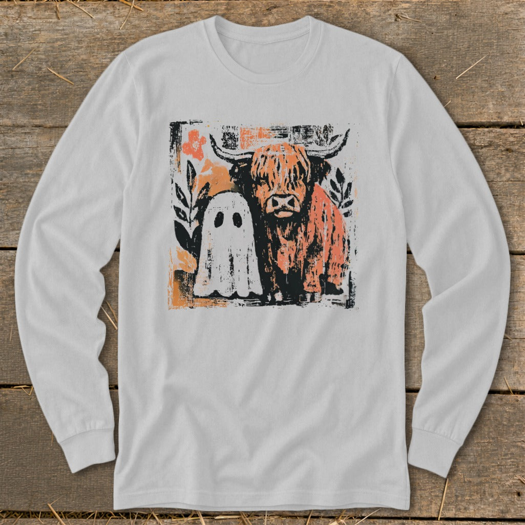White long-sleeve shirt with Highland cow and ghost Halloween graphic.