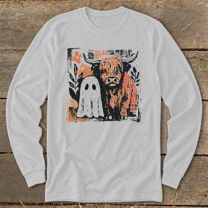 White long-sleeve shirt with Highland cow and ghost Halloween graphic.