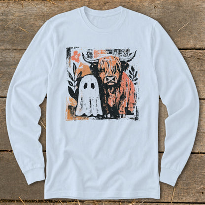 Long sleeve t-shirt with a graphic of a Highland cow and a ghost.